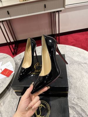 Black patent pump held to show the side profile — supplier photo